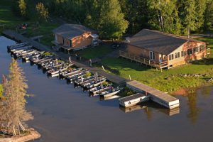 An aerial view of the Lodge, tackle shop and 14 of our fishing boats.
