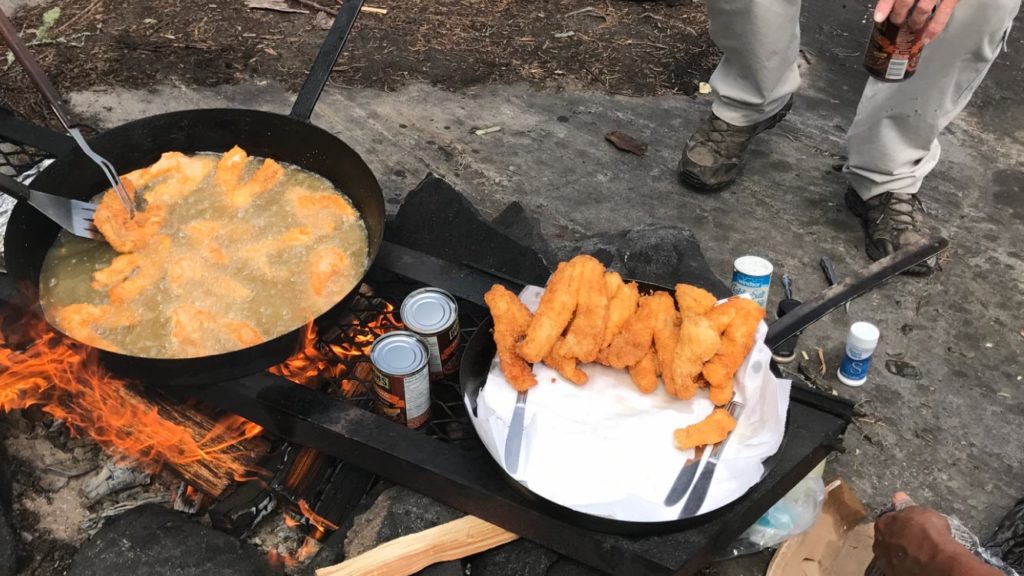 Pan-fried walleye strips ready to eat.