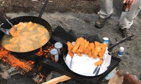 Pan-fried walleye strips ready to eat.