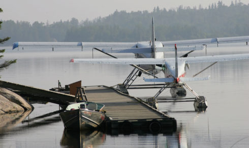 Float planes at dock, ready for fly-in fishing.