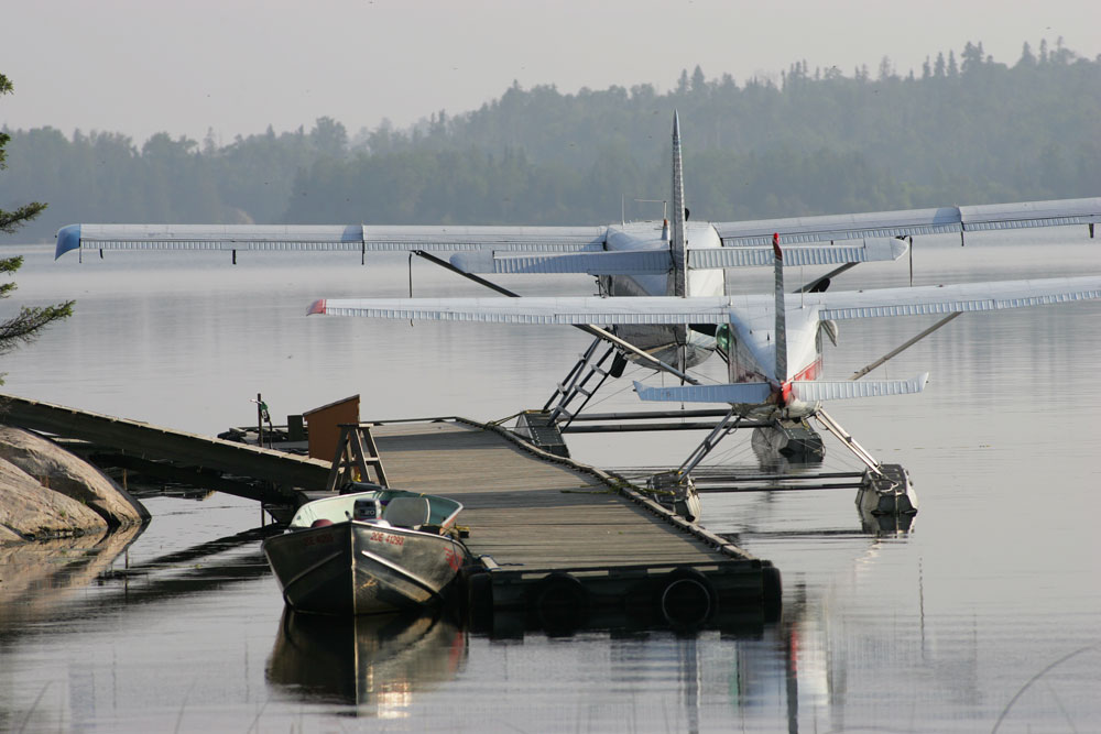 Float planes at dock, ready for fly-in fishing.