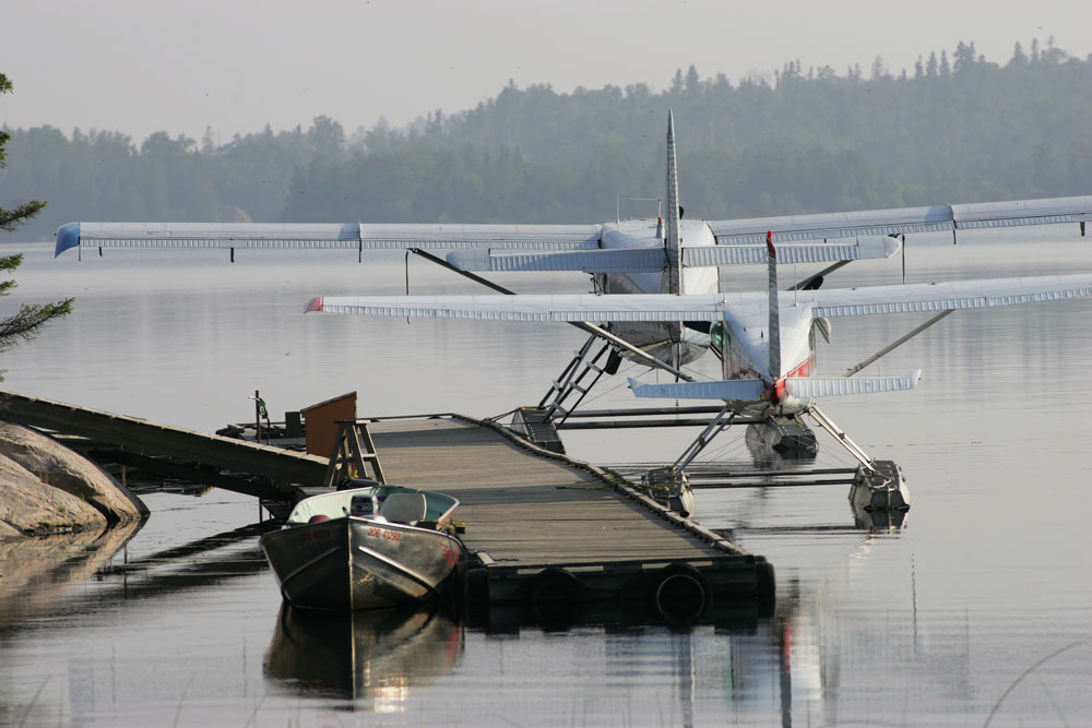 Float planes at dock, ready for fly-in fishing.