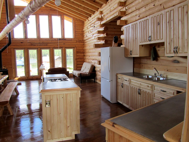 Interior kitchen and living area of a fly-in cabin.