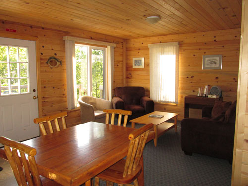 Dining and living space inside one of the Kettle Falls fishing resort cabins.