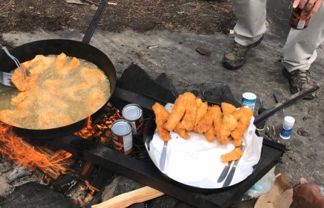Pan-fried walleye strips ready to eat.