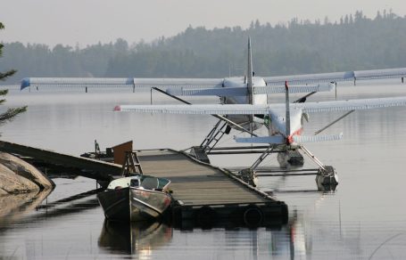 Float planes at dock, ready for fly-in fishing.
